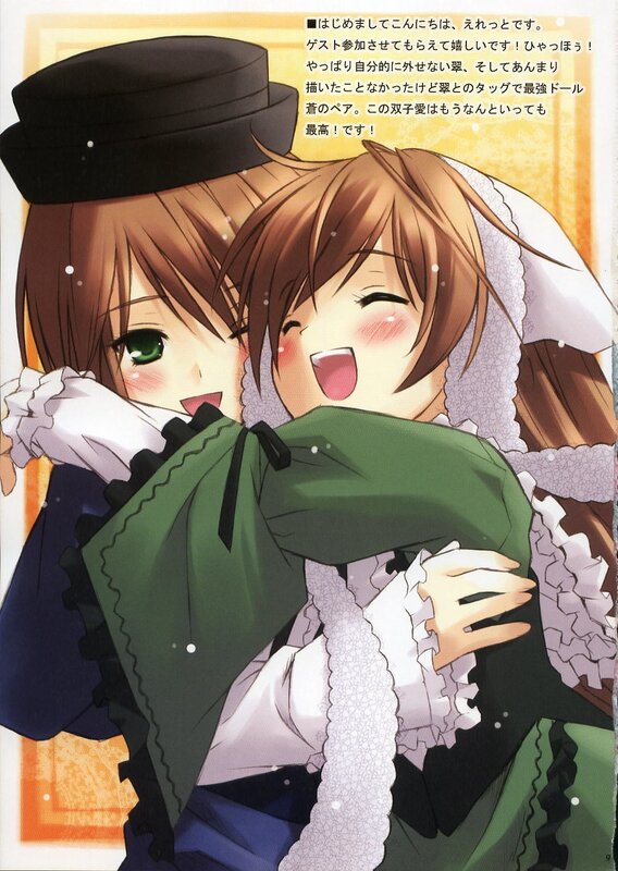 Two girls hugging in winter clothes