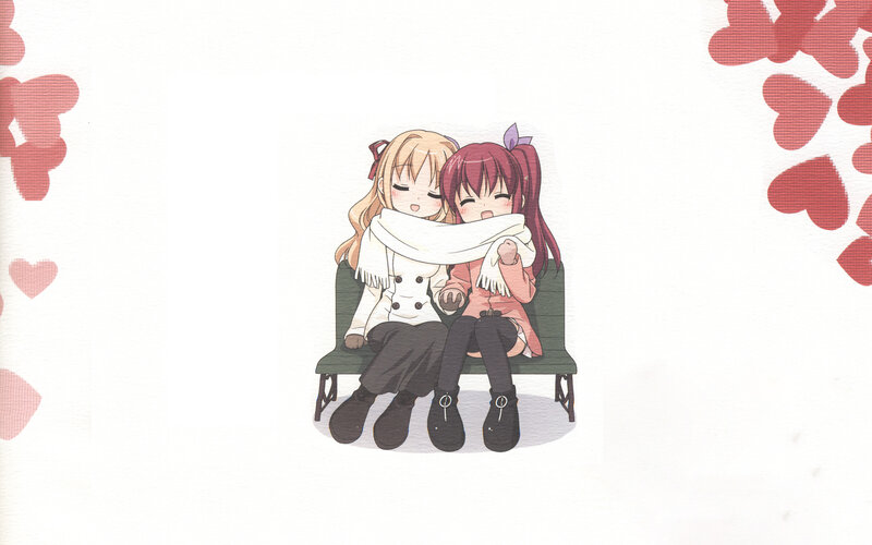 two girls hugging on a bench