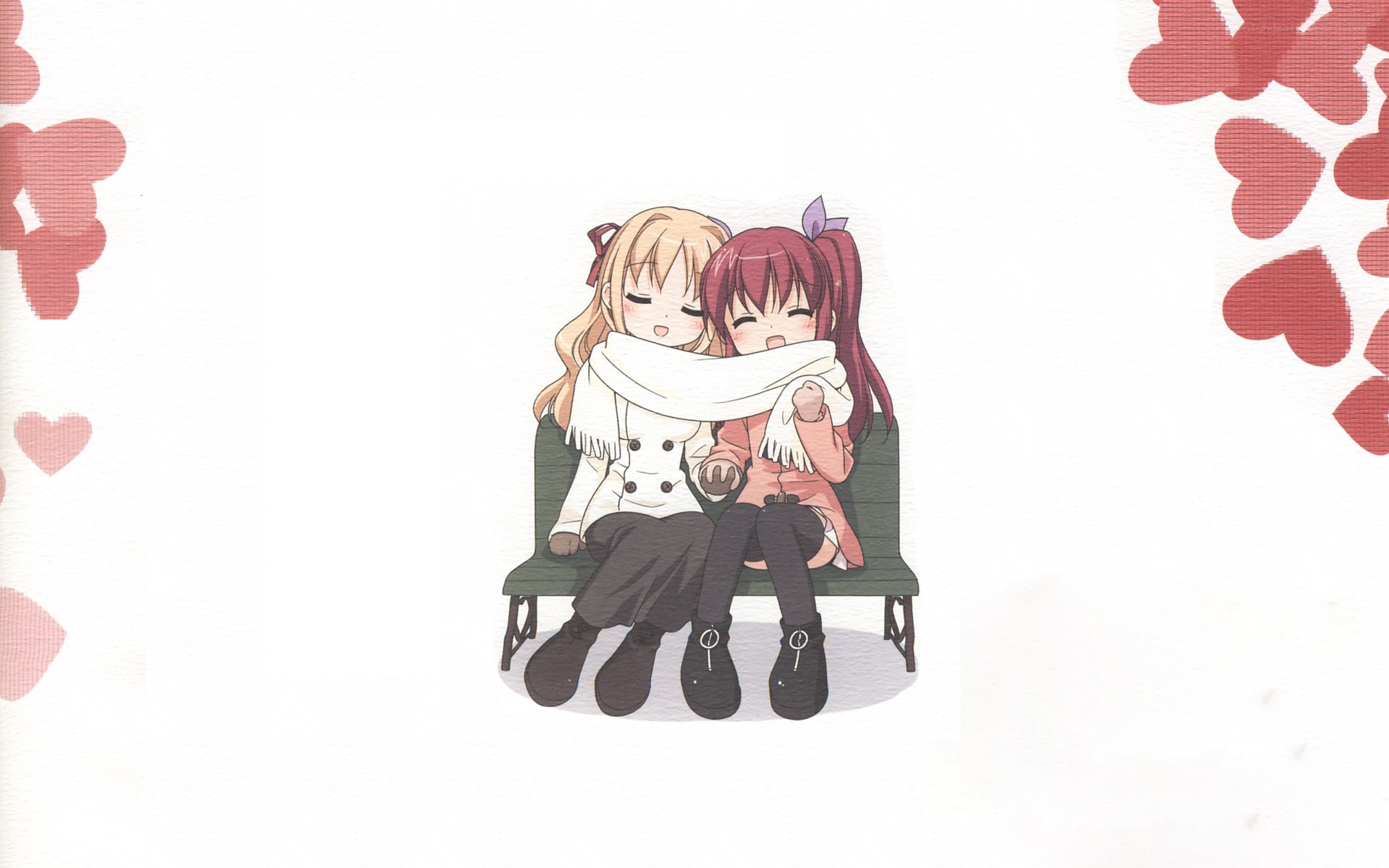 two girls hugging on a bench
