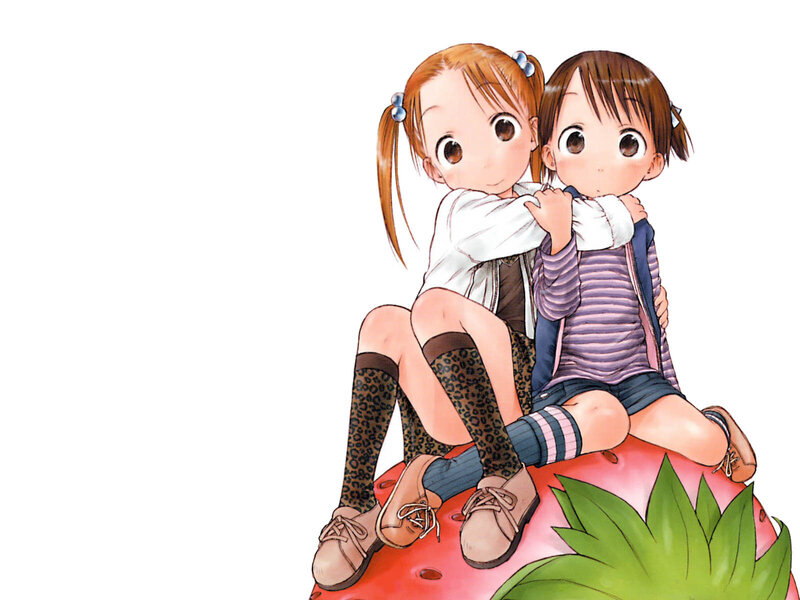 two girls hugging on a strawberry