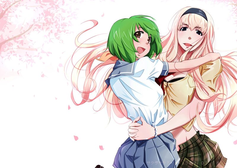 Two girls hugging under cherry blossoms