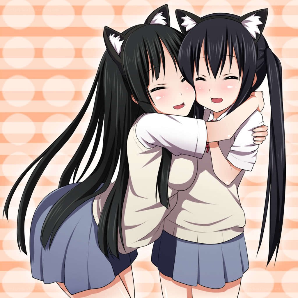 Two girls hugging with cat ears