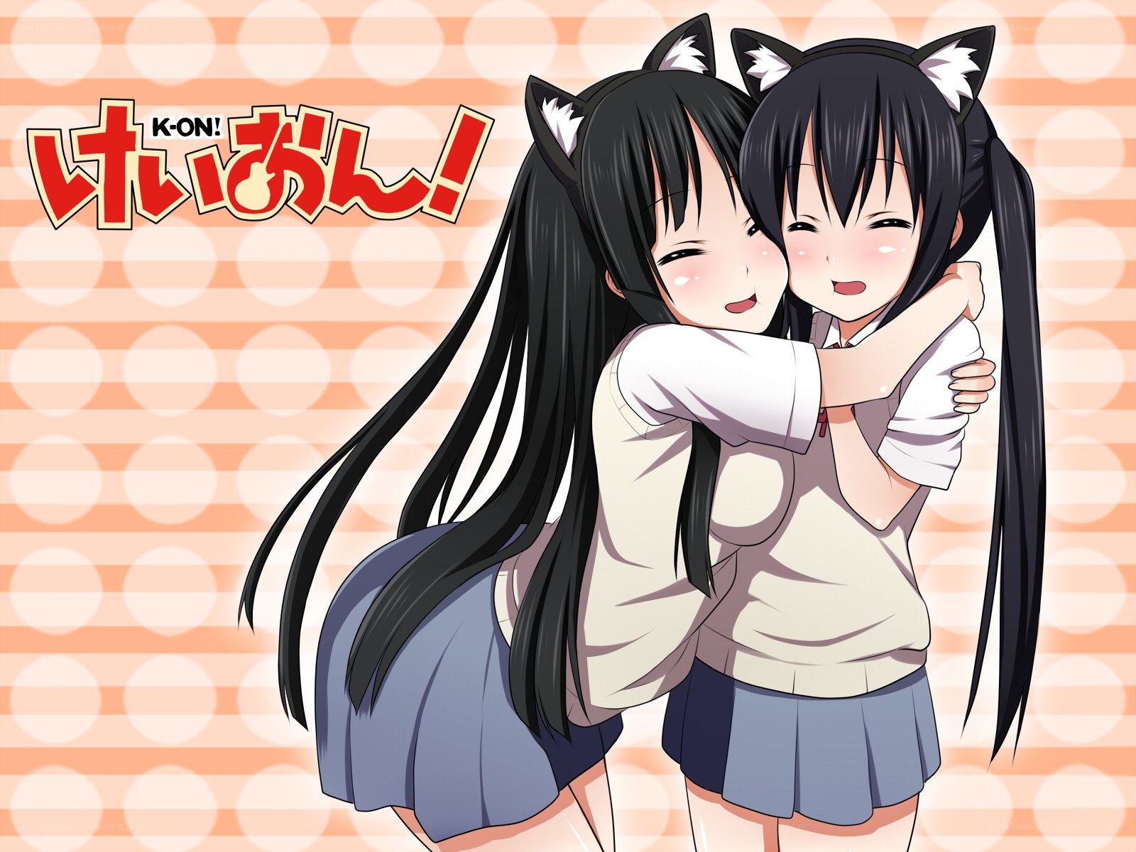 Two girls hugging with cat ears