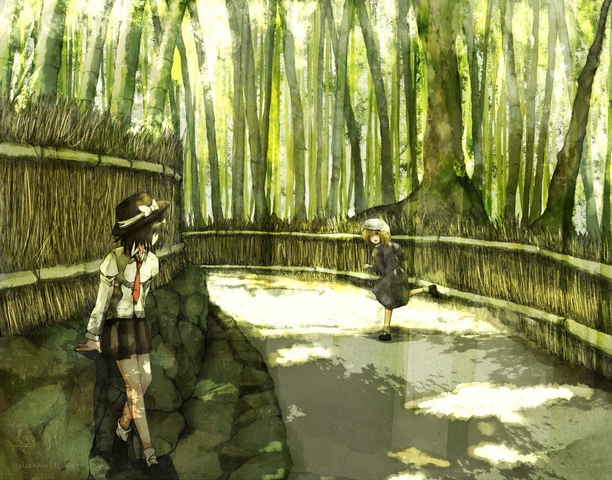 Two girls in a bamboo forest