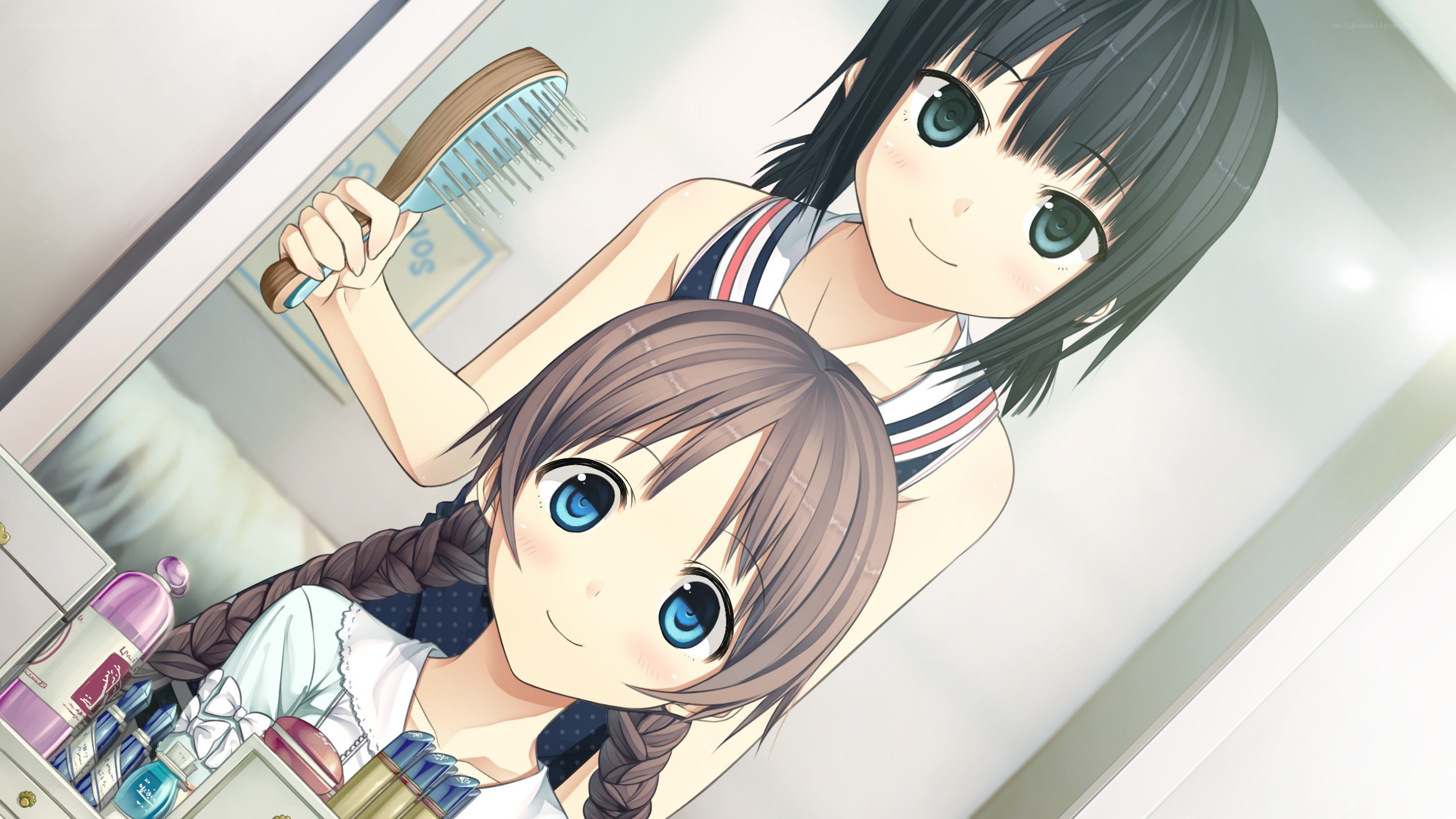 Two girls in a bathroom