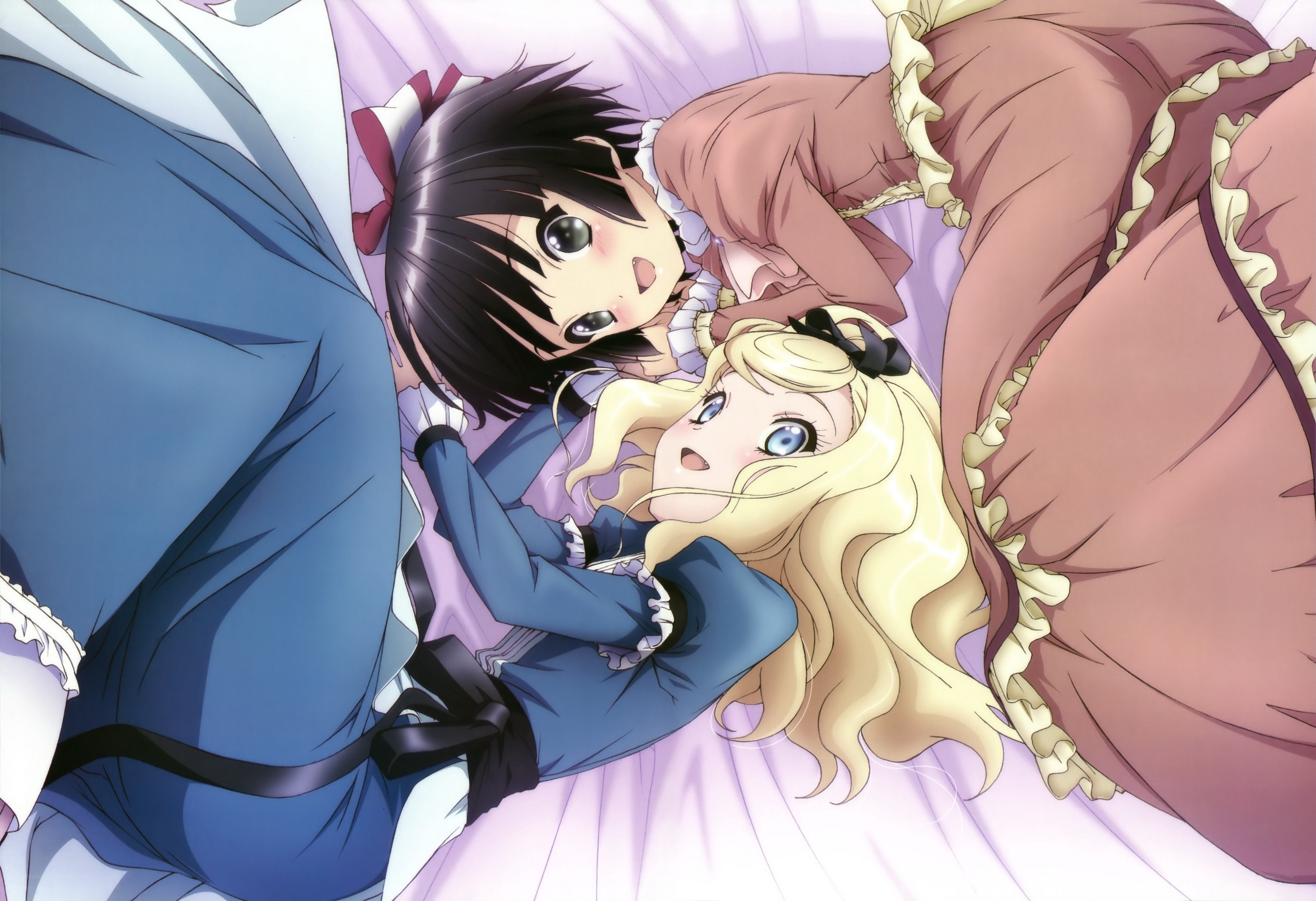 Two girls in a bed
