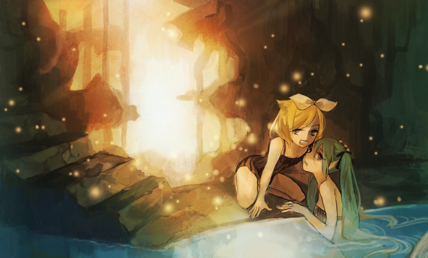 two girls in a cave pool