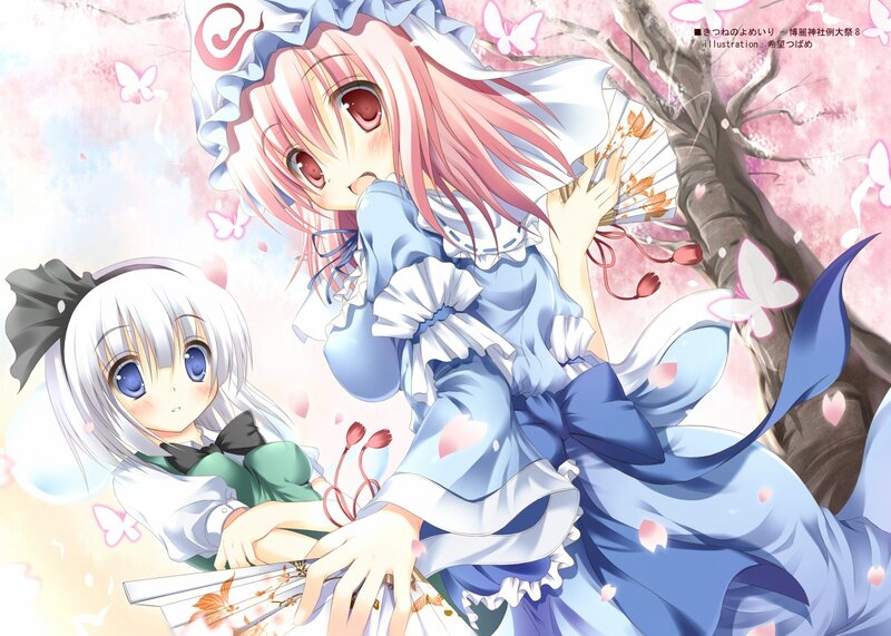 Two girls in a cherry blossom garden