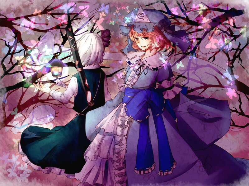 Two girls in a cherry blossom garden