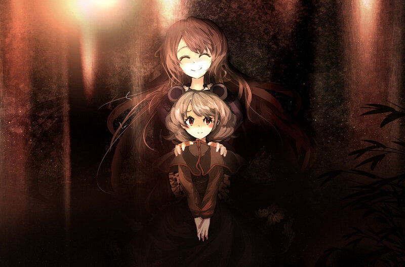 Two girls in a dark forest