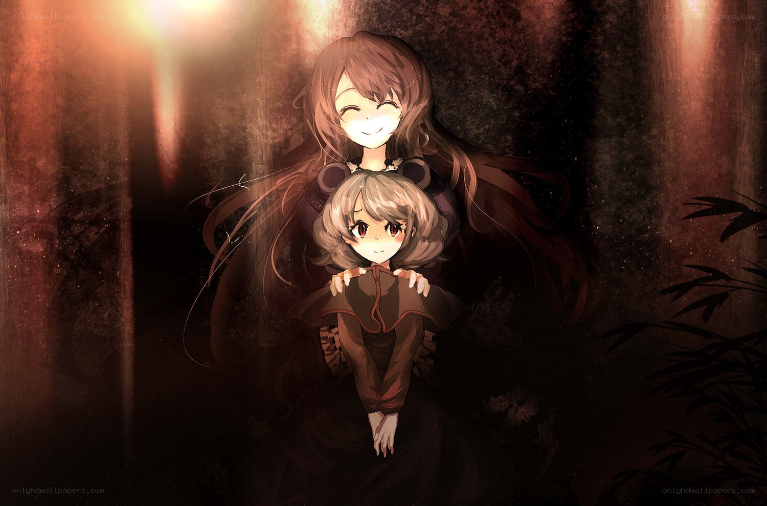 Two girls in a dark forest