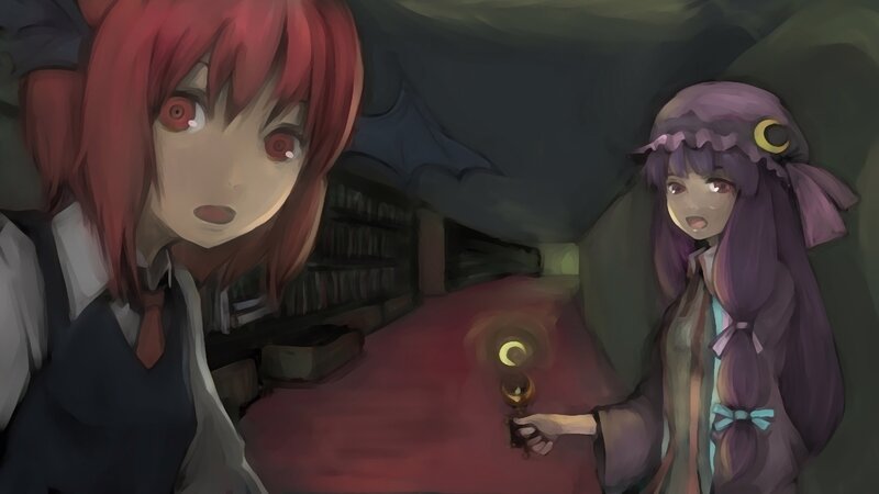 Two girls in a dark room