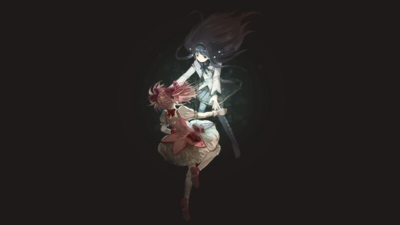 two girls in a dark space