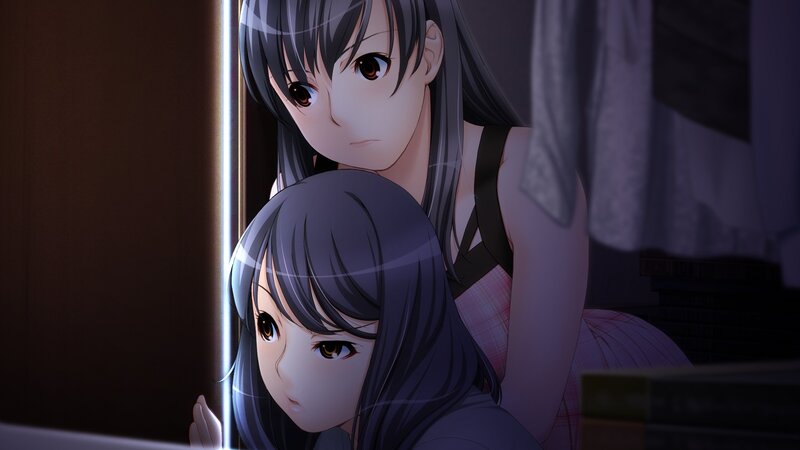 two girls in a dim room