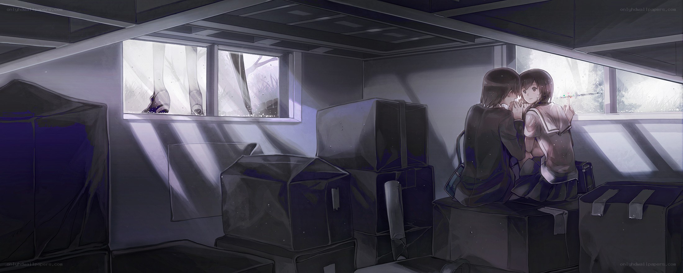 Two girls in a dim room