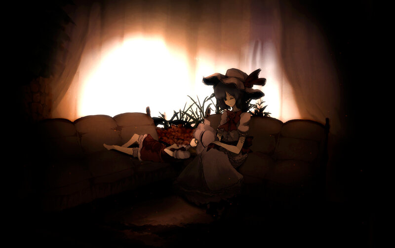 Two girls in a dimly lit room