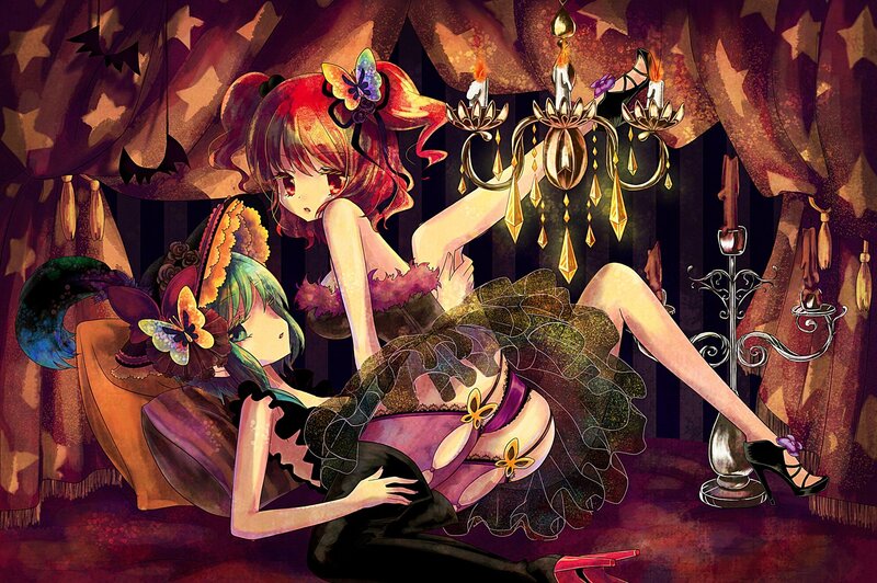 Two girls in a dimly lit room