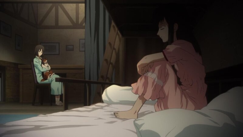 Two girls in a dimly lit room