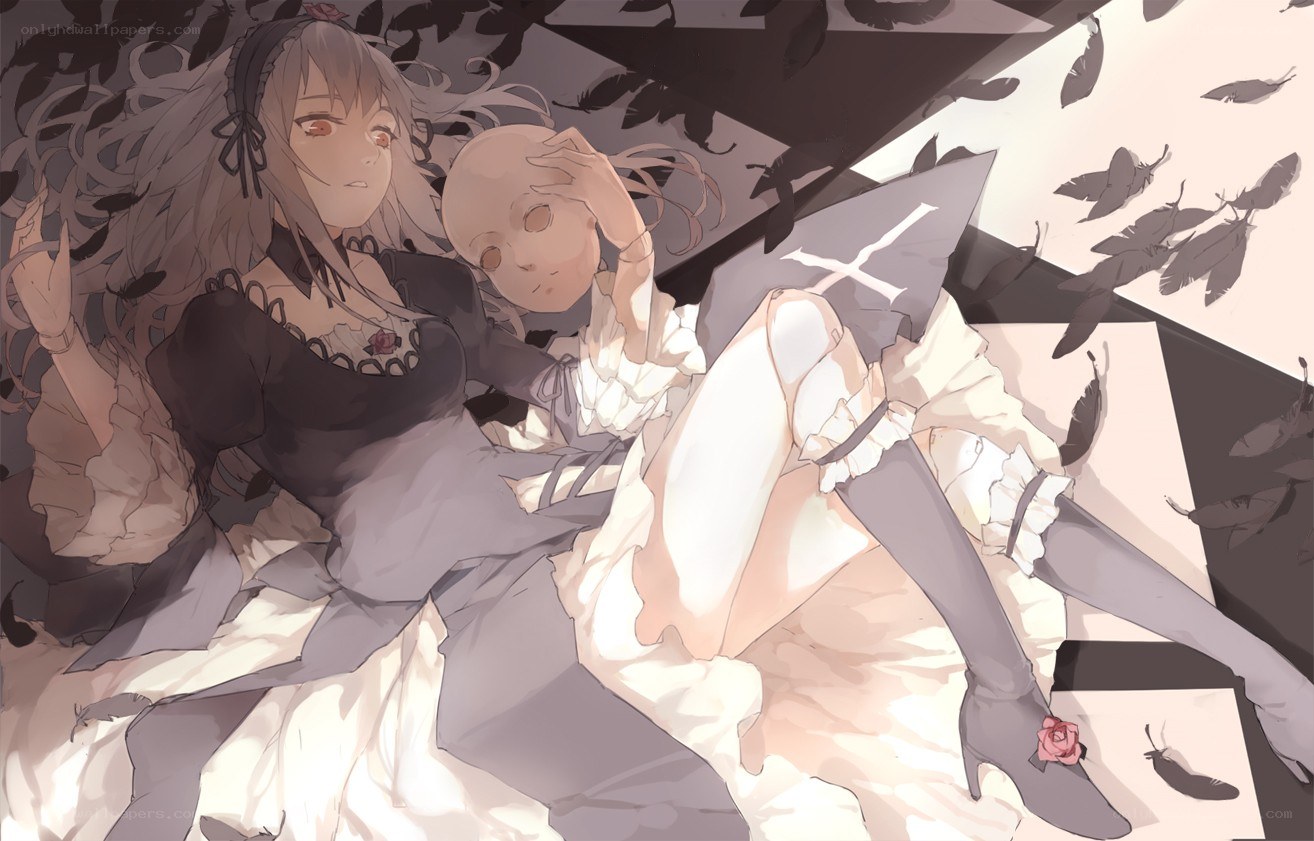Two girls in a feather-filled room