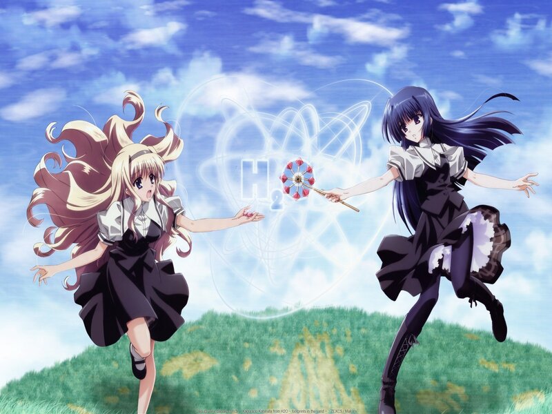 Two girls in a field with H2O