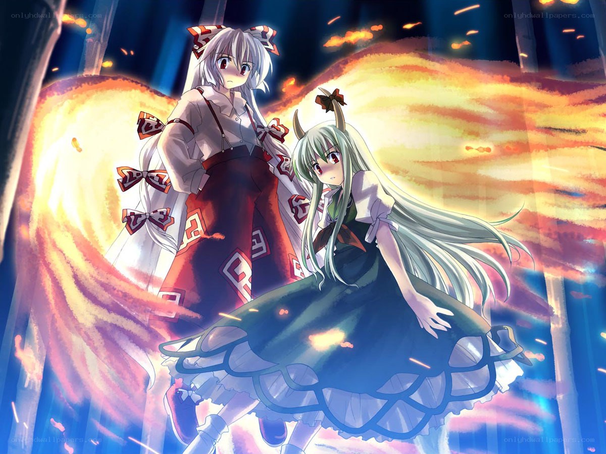 Two girls in a fiery scene