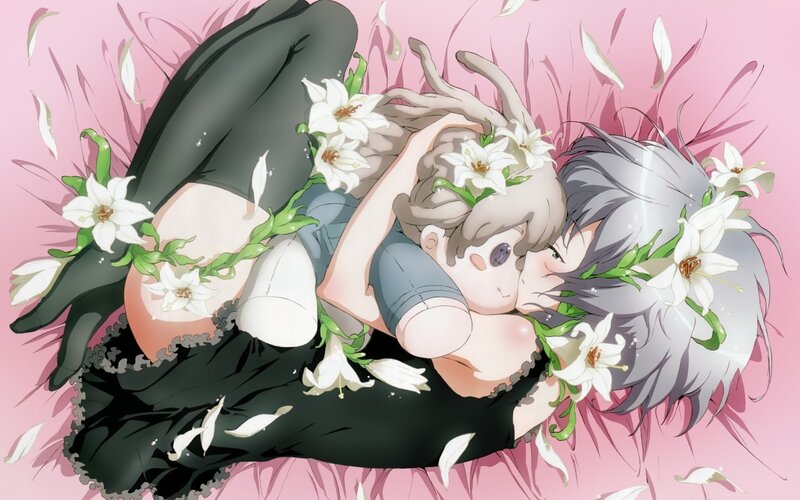 Two girls in a floral embrace