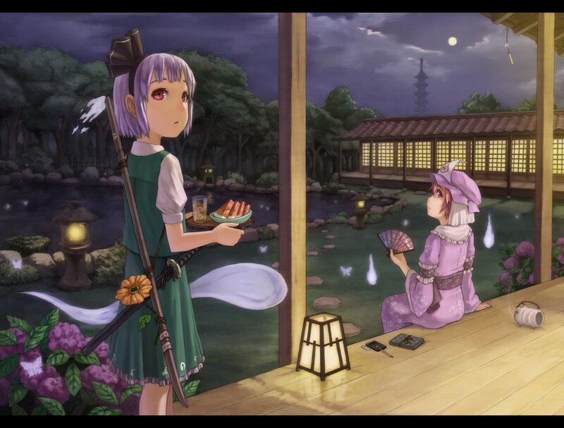 Two girls in a garden at night