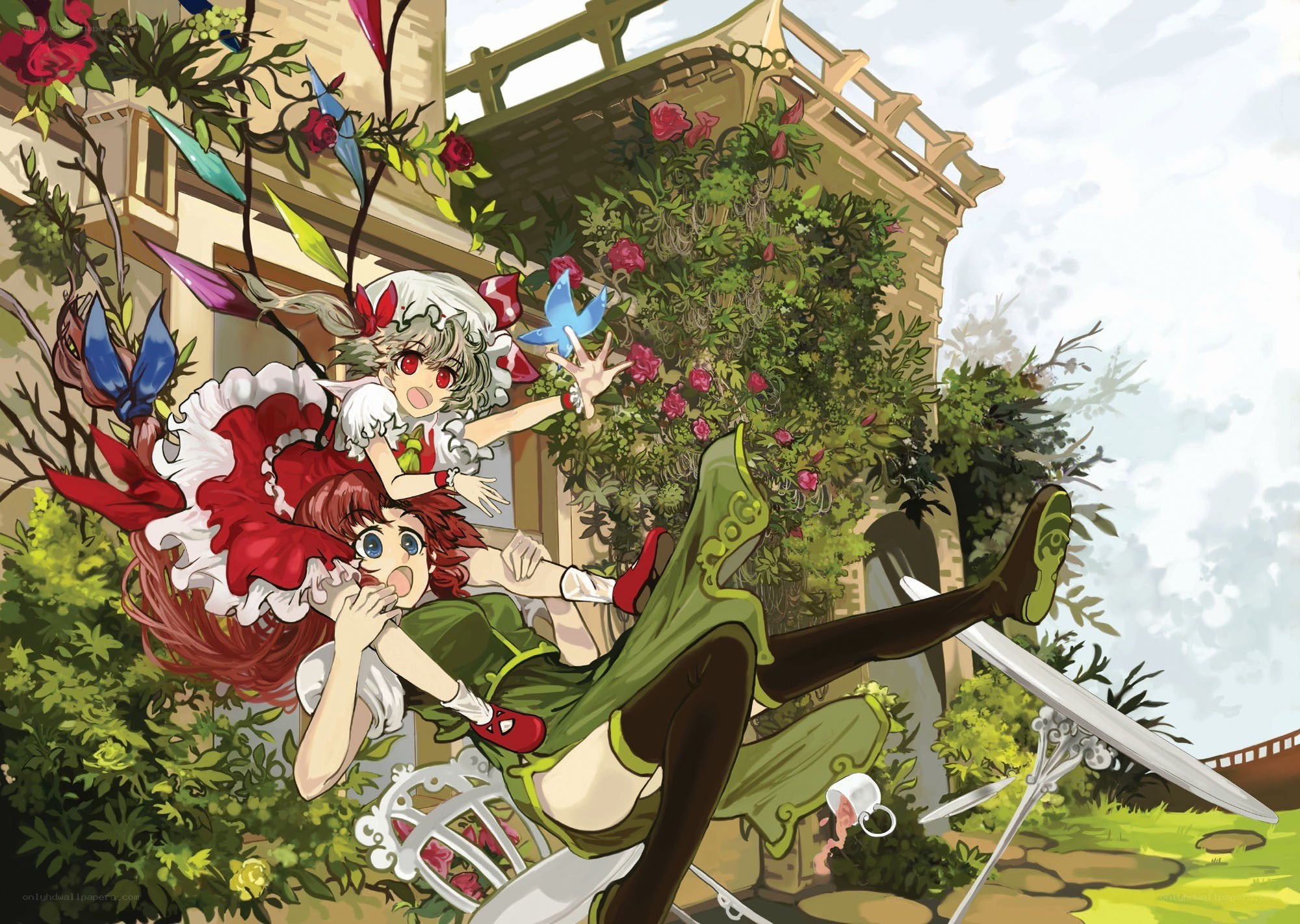 Two girls in a garden fall