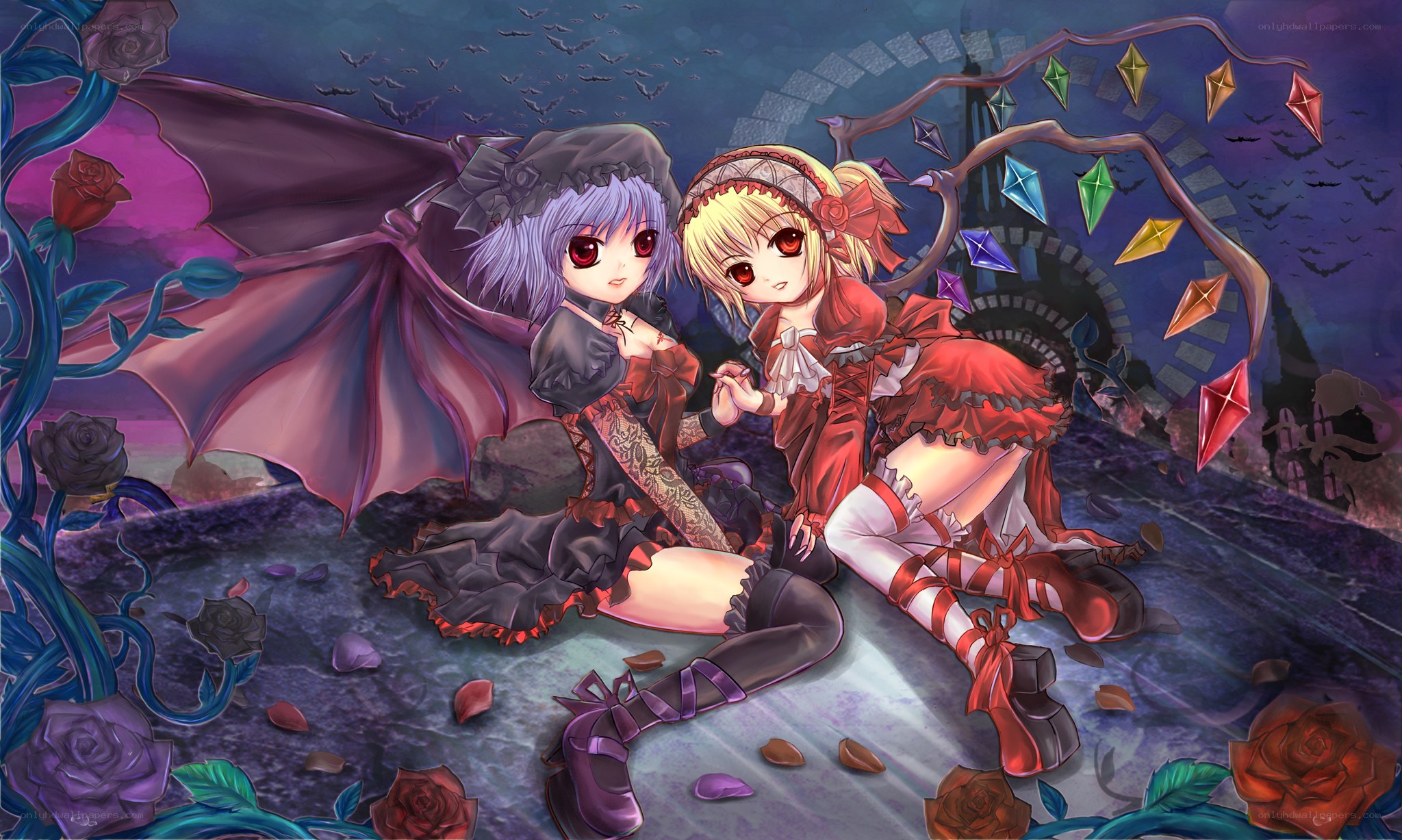 Two girls in a gothic garden