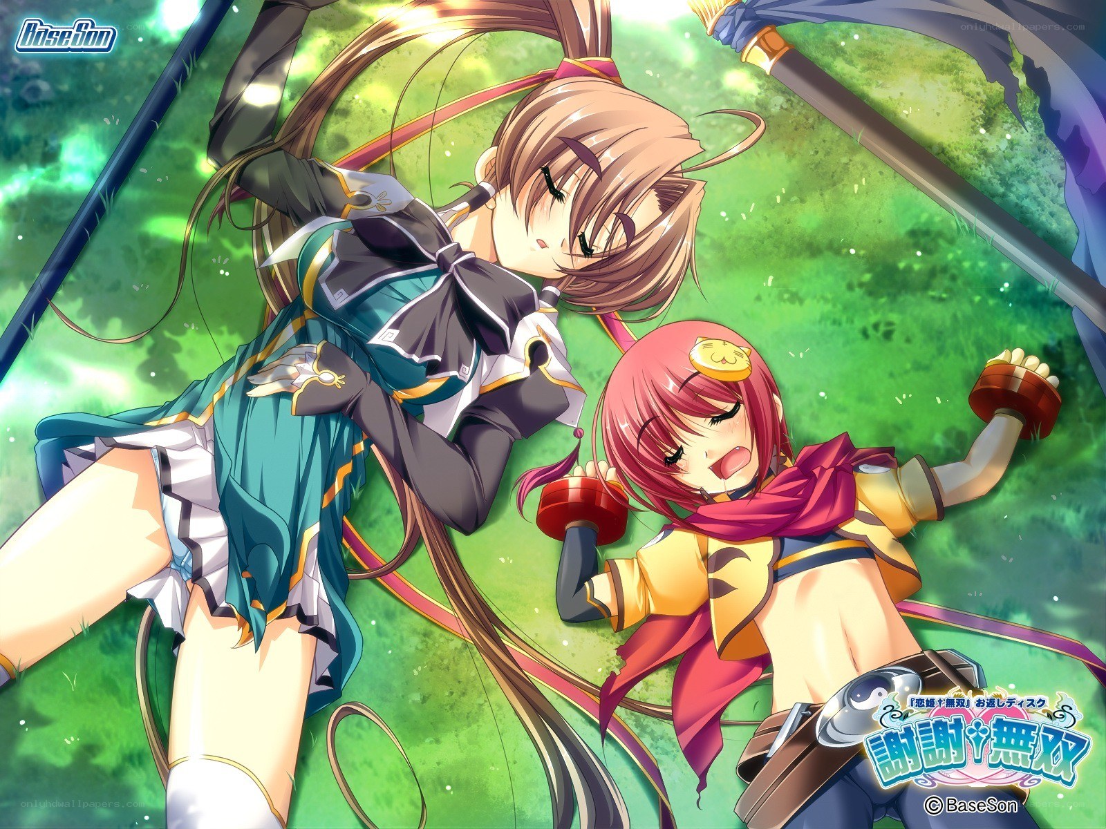 Two girls in a grassy field