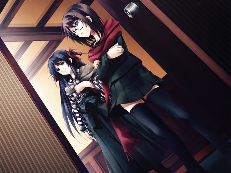 two girls in a hallway