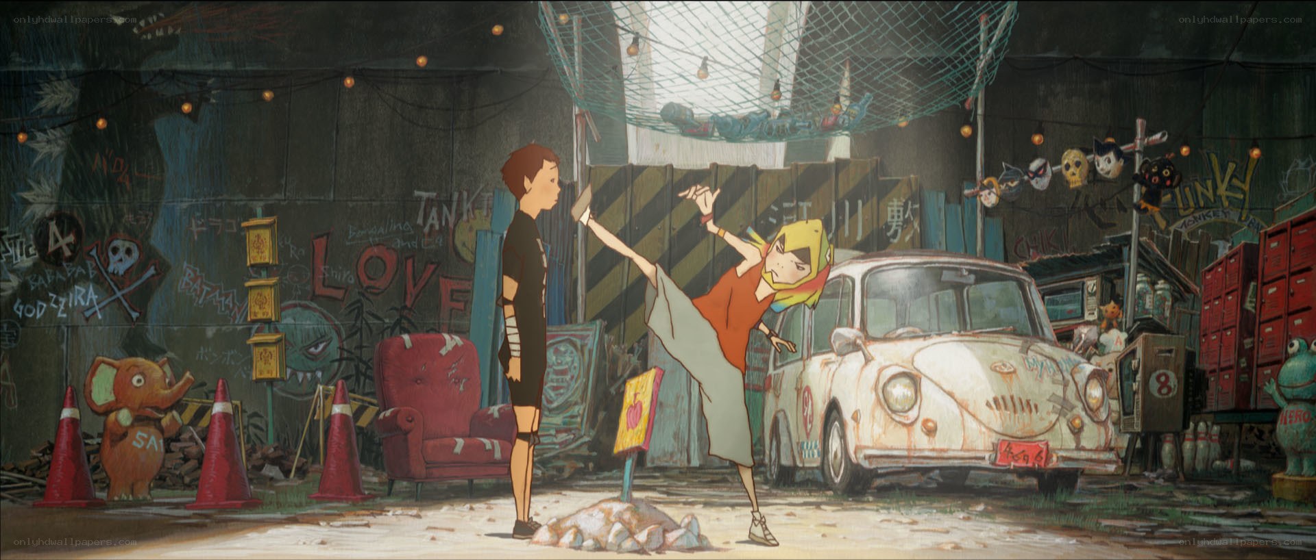 Two girls in a junkyard