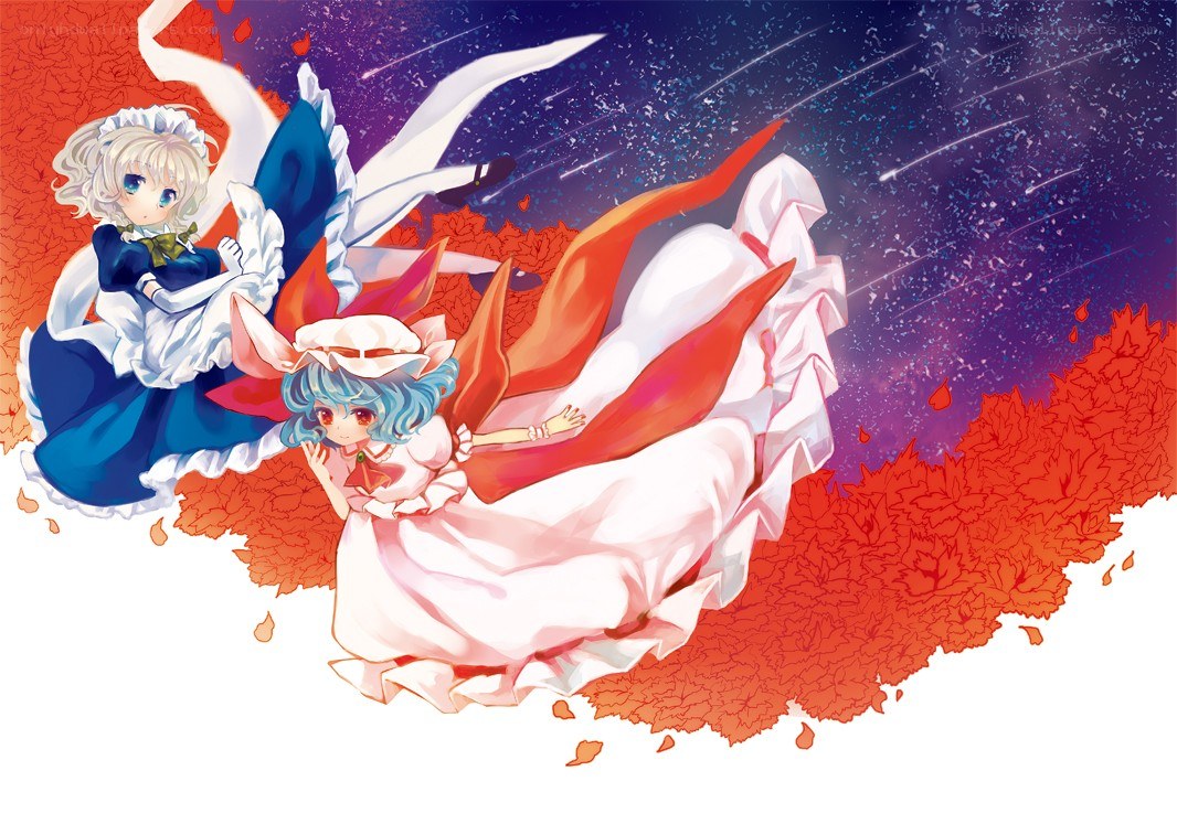 Two girls in a leaf storm