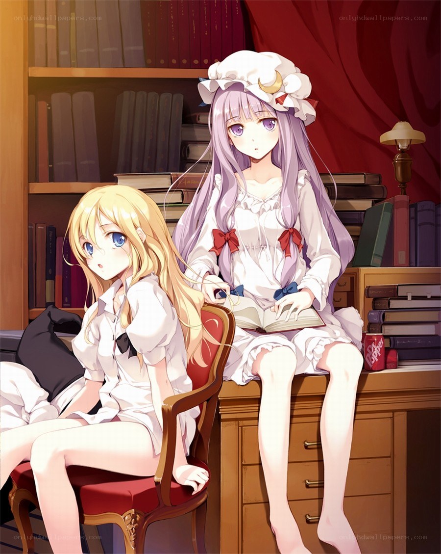 Two girls in a library