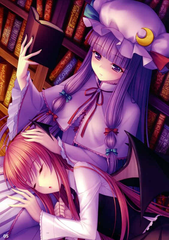Two girls in a library
