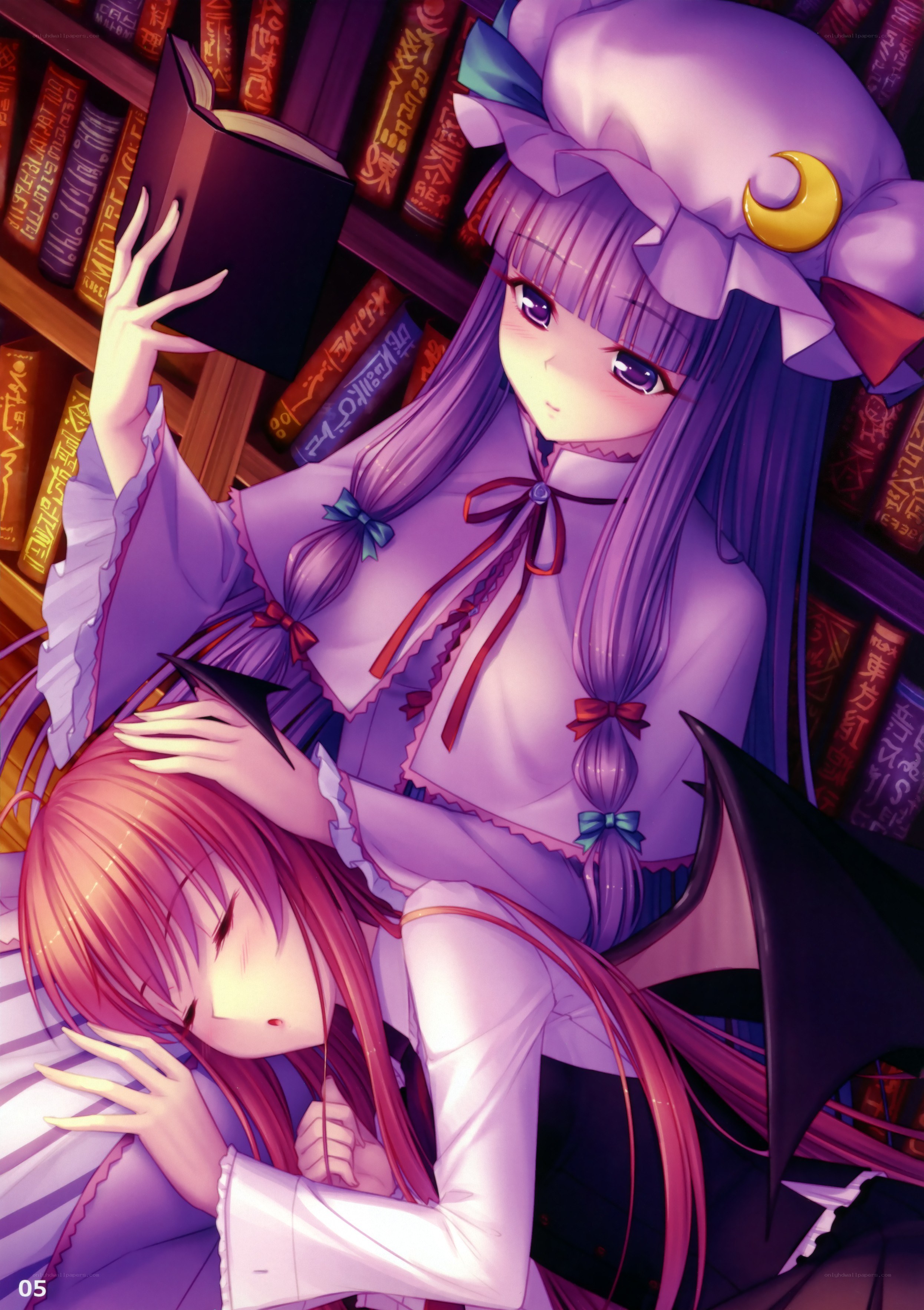 Two girls in a library