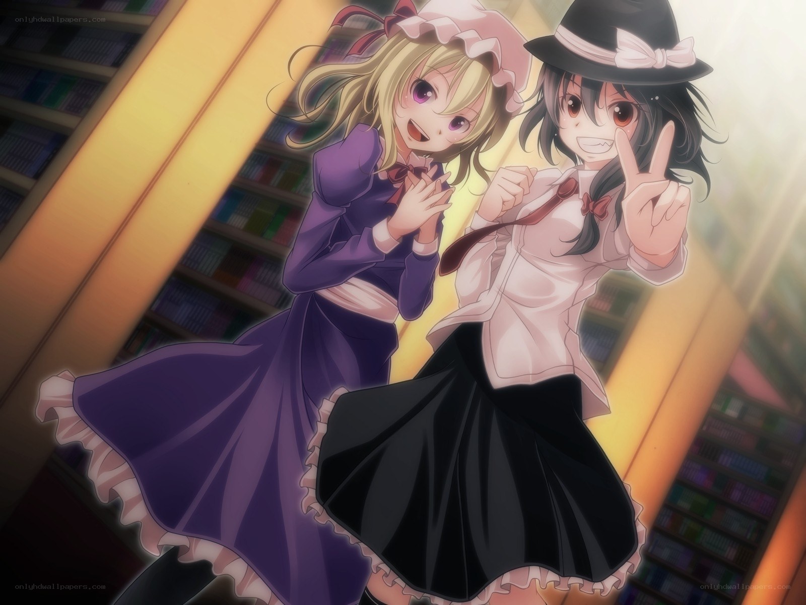 Two girls in a library