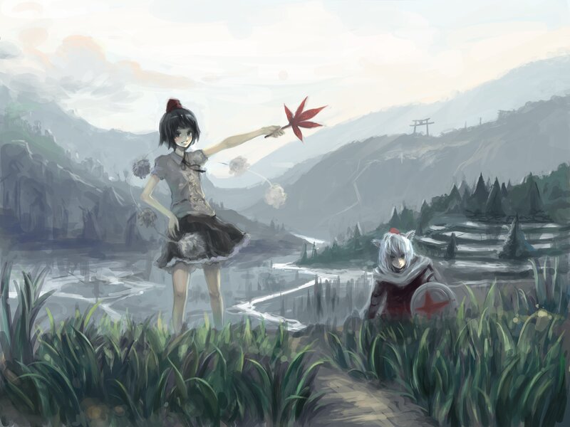 Two girls in a misty valley
