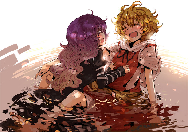 Two girls in a muddy puddle