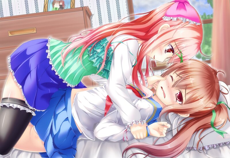 Two girls in a playful embrace