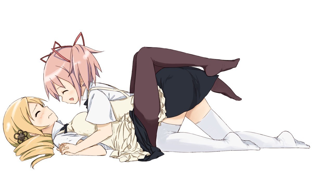 Two girls in a playful pose