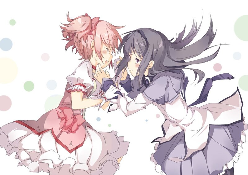 Two girls in a playful struggle