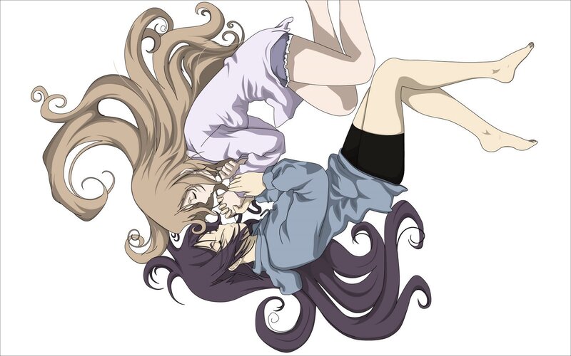 two girls in a playful tangle