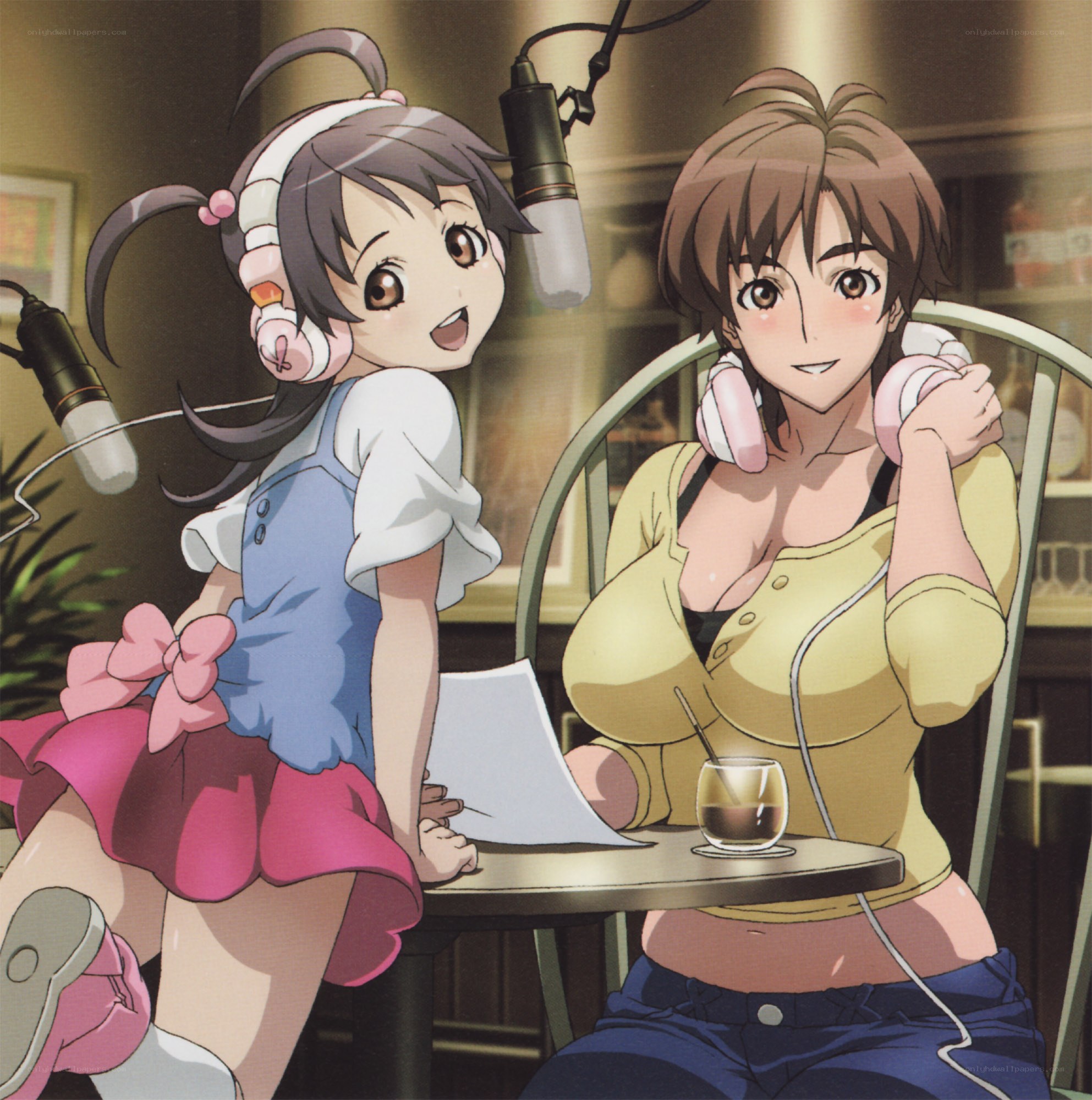 Two girls in a recording studio