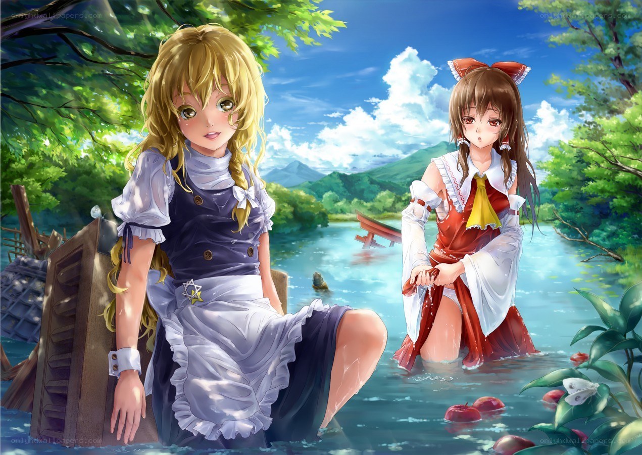 Two girls in a river