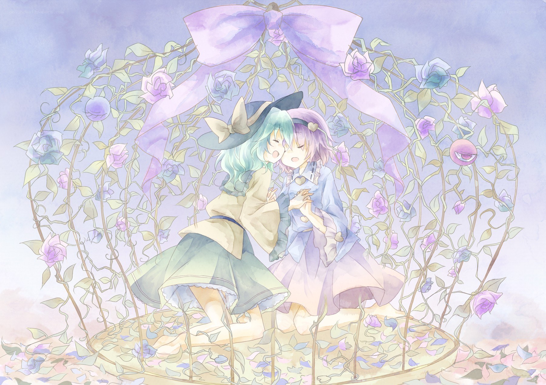 Two girls in a rose arch