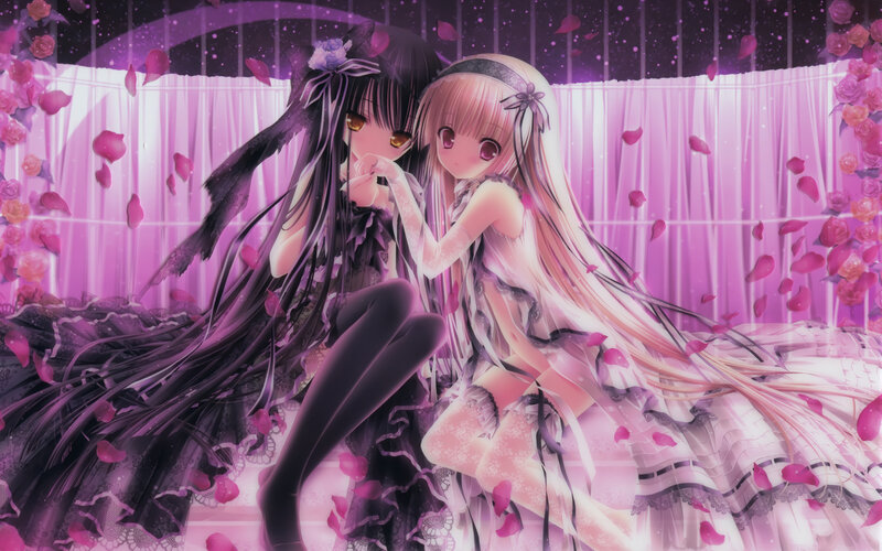 Two girls in a rose garden