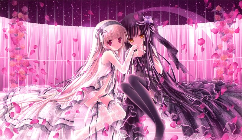 Two girls in a rose garden