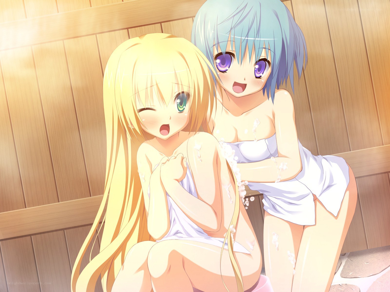 Two girls in a sauna