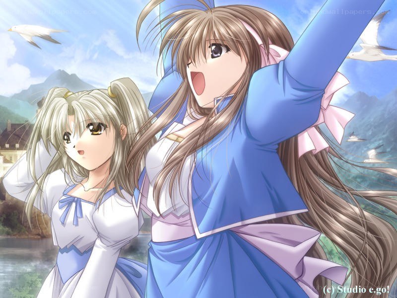Two girls in a scenic landscape
